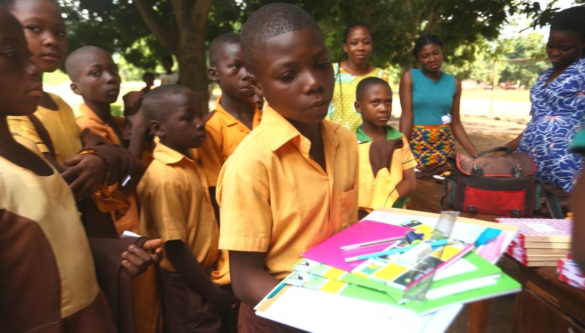 school children receiving supplies
